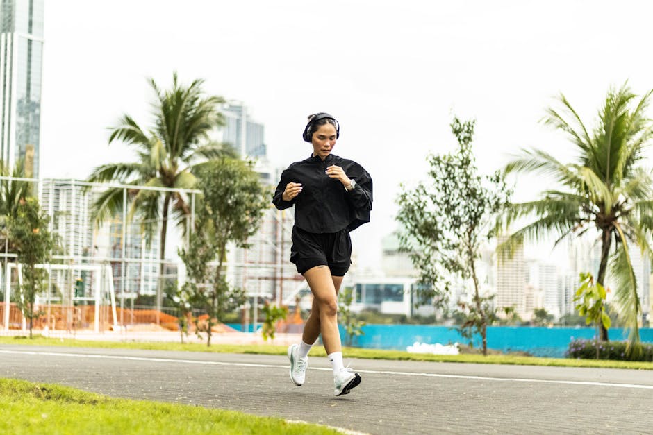 A woman enjoying a morning run in a vibrant park in Panama City, Panama.